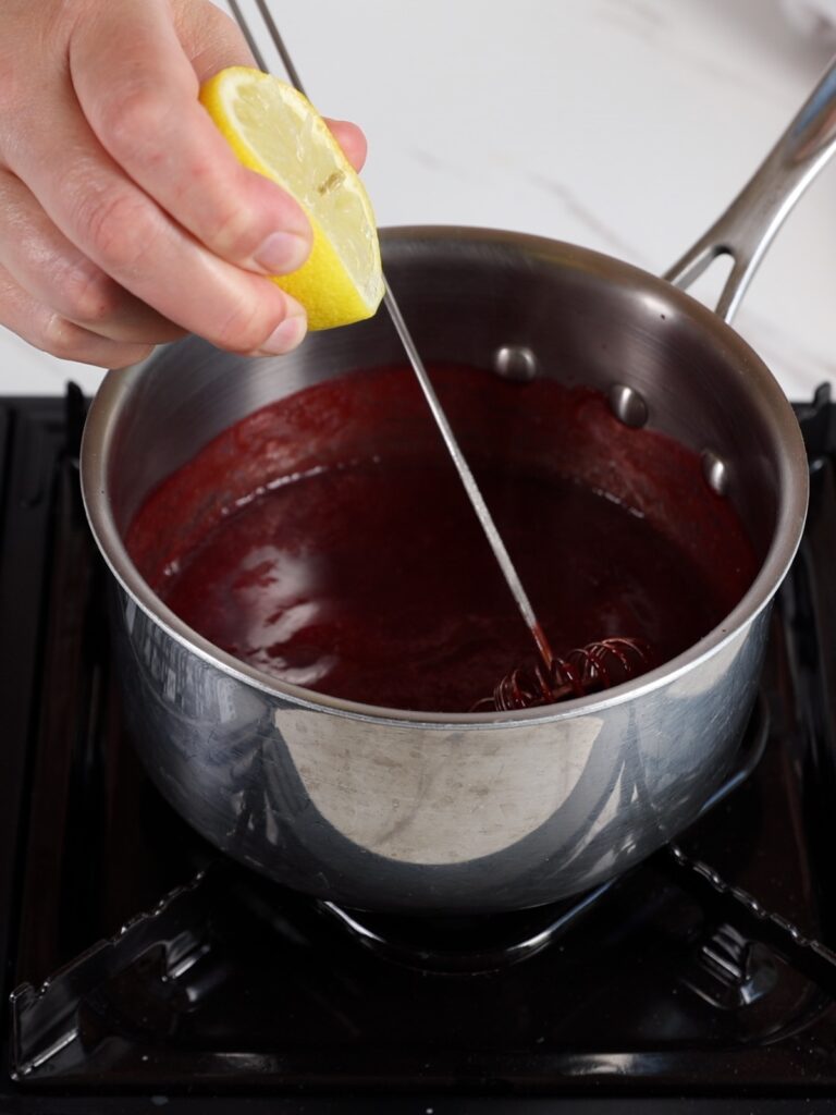 Raspberry puree in the saucepan.