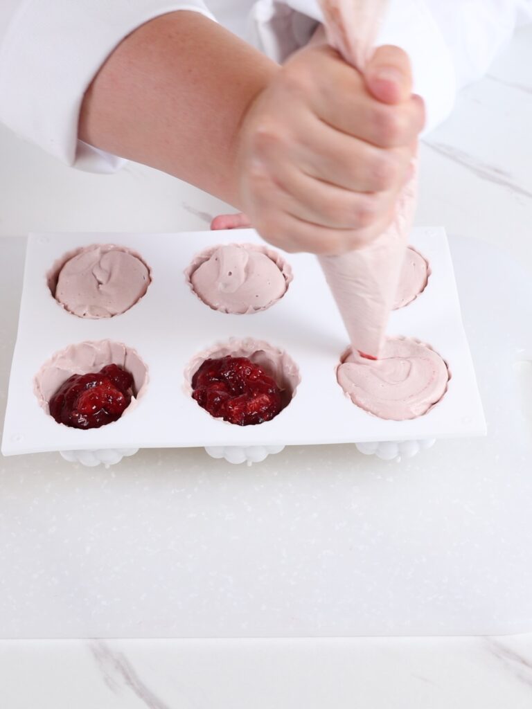 Assembling viral raspberry dessert.