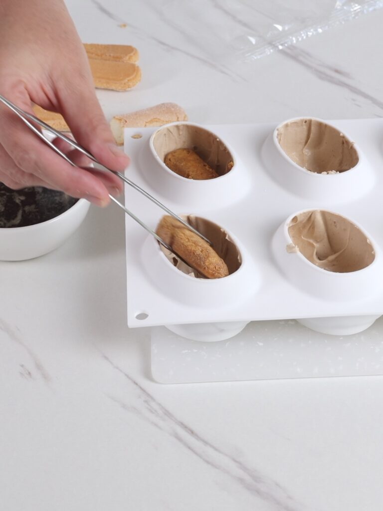 Assembling coffee dessert. 