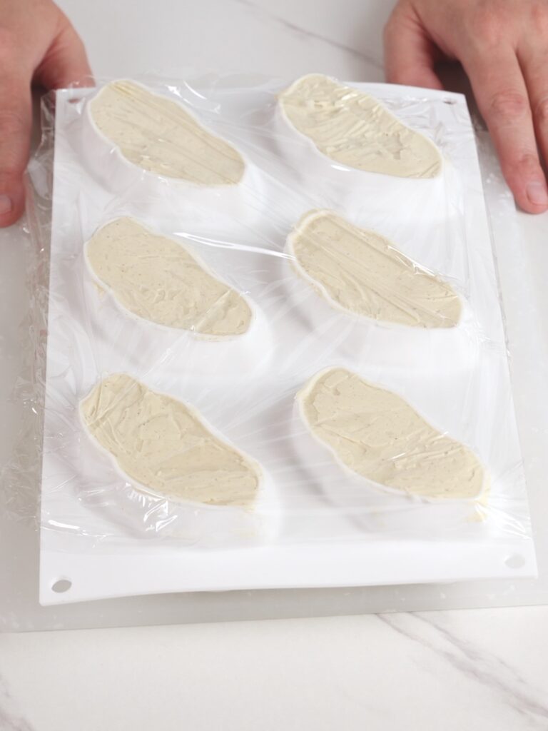Assembling pistachio dessert.