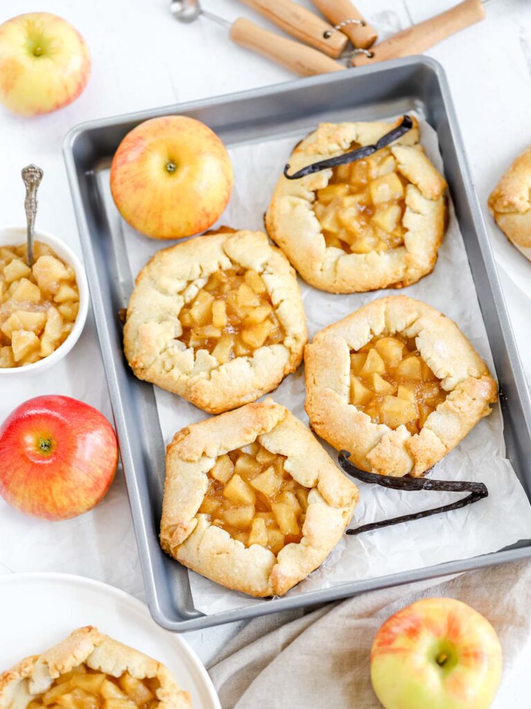 Mini apple galettes on the tray.