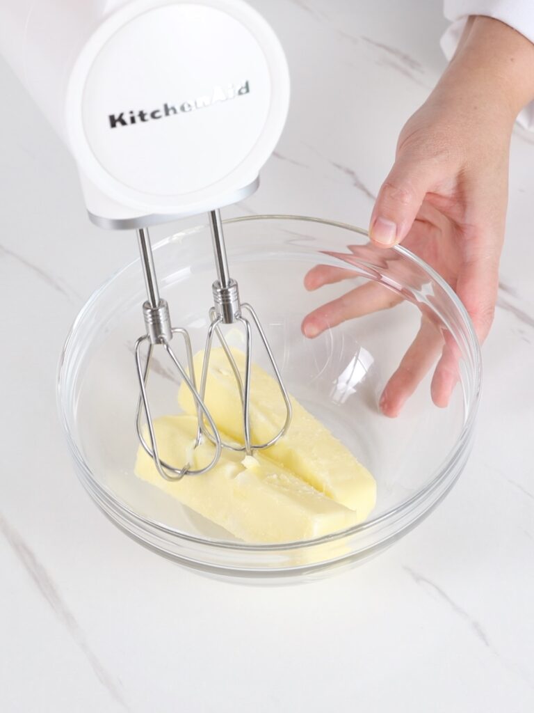 Butter in the mixing bowl. 