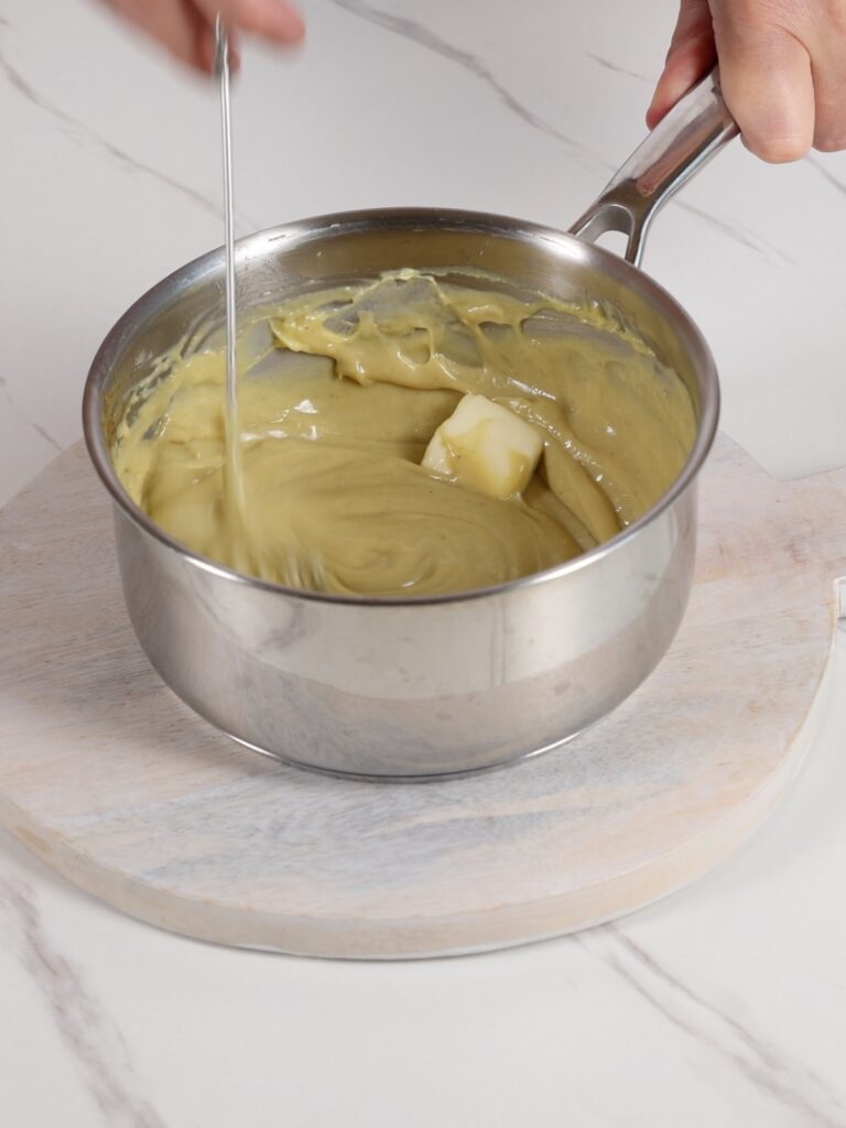 Pistachio filling in the saucepan. 