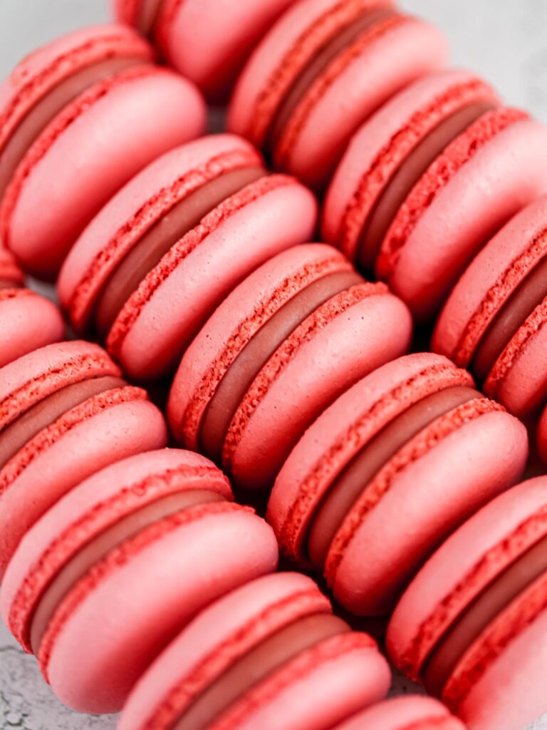 Pink macarons on the table. 